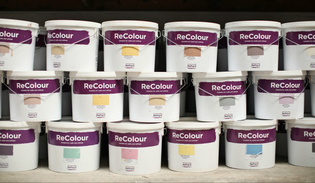 A selection of low cost and eco ReColour emulsion paint on a shelf. 