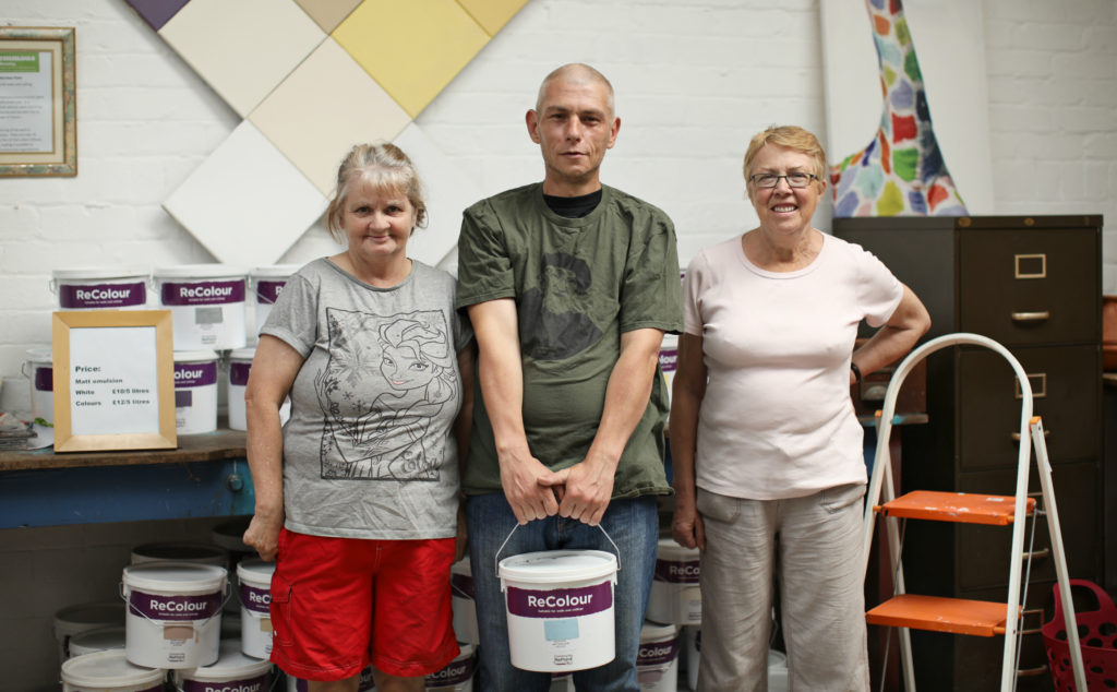 Group photo of staff at Community RePaint scheme.