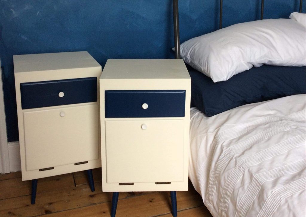 Upcycled chest of drawers using recycled paint from Community RePaint Bristol City. The chest of drawers have been painted with cream paint and navy blue paint.